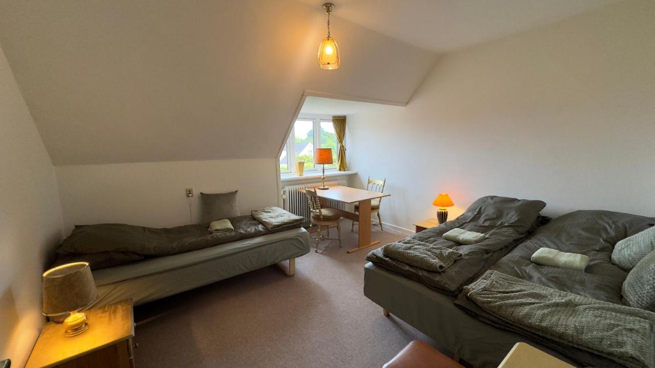 Chambre Triple avec Salle de Bains Commune