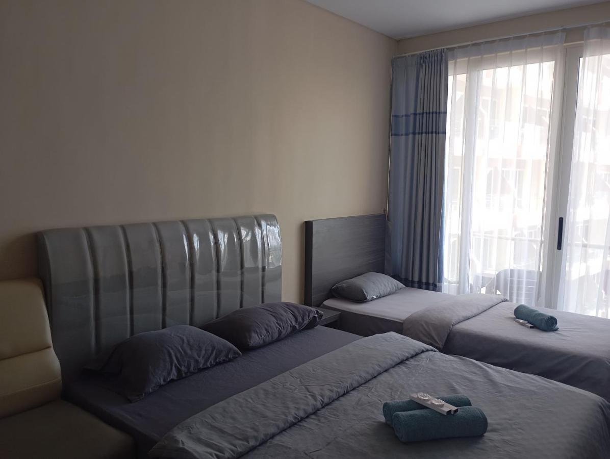 Camera Matrimoniale Deluxe (2 Adulti + 1 Bambino)