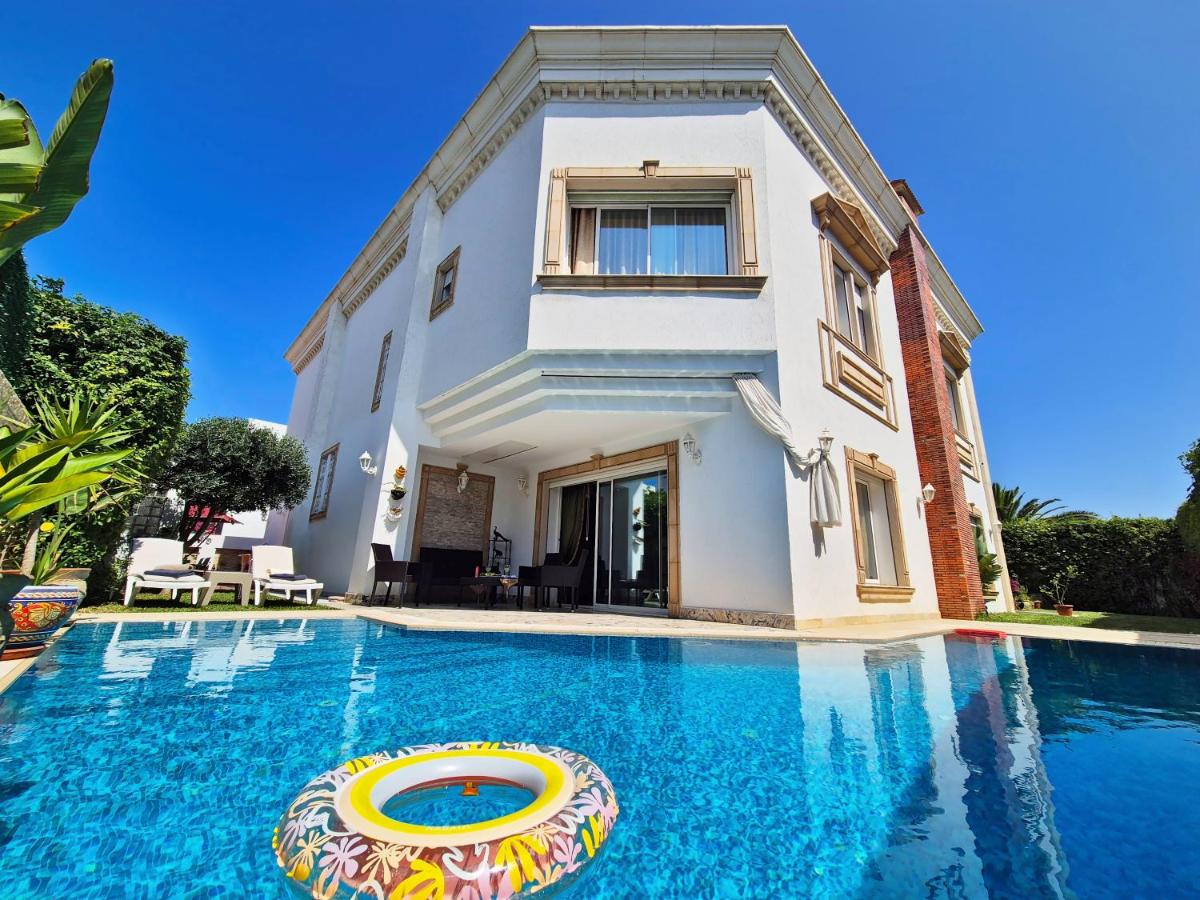 L'Orchidée - Suites de Luxe avec Piscine Chauffée et Vue sur le Lac de Tunis - B&B