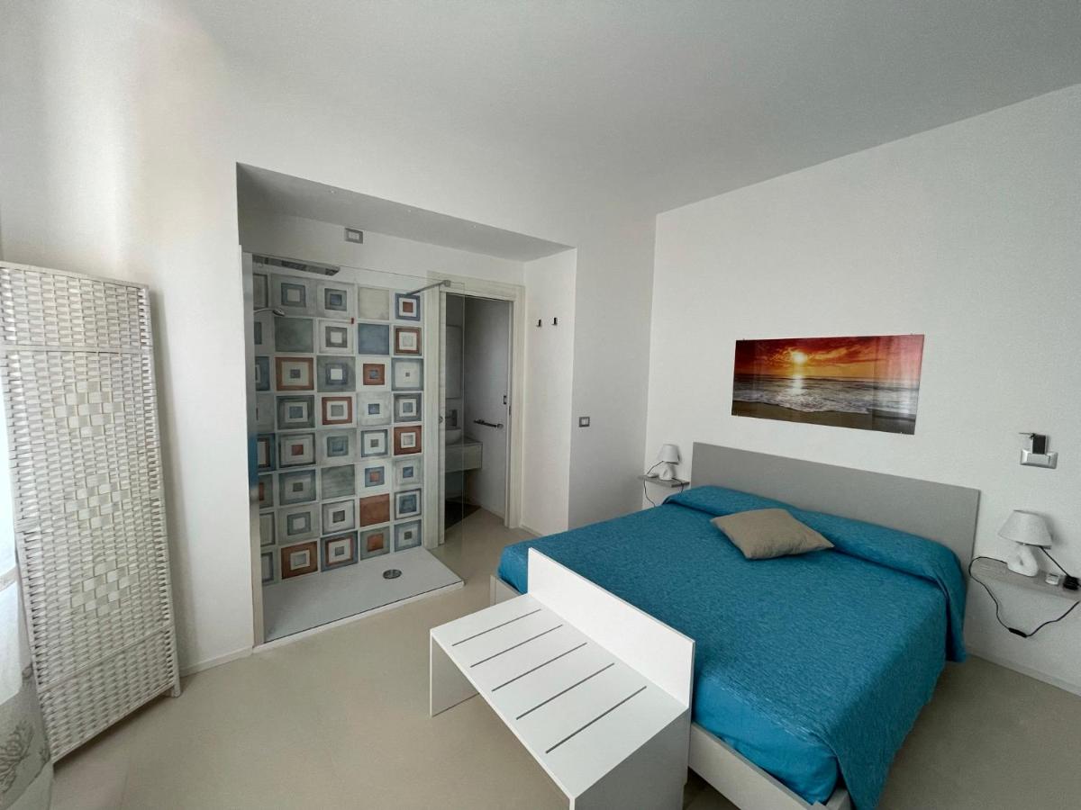 Camera Matrimoniale Deluxe (2 Adulti + 1 Bambino) 