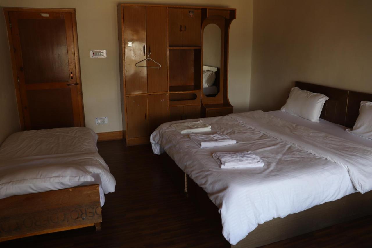 Chambre Quadruple avec Salle de Bains Privative