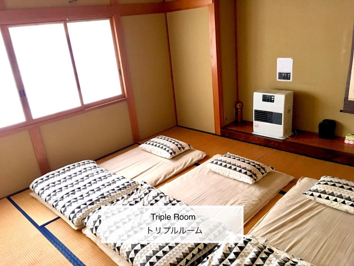 Chambre Triple avec Salle de Bains Commune