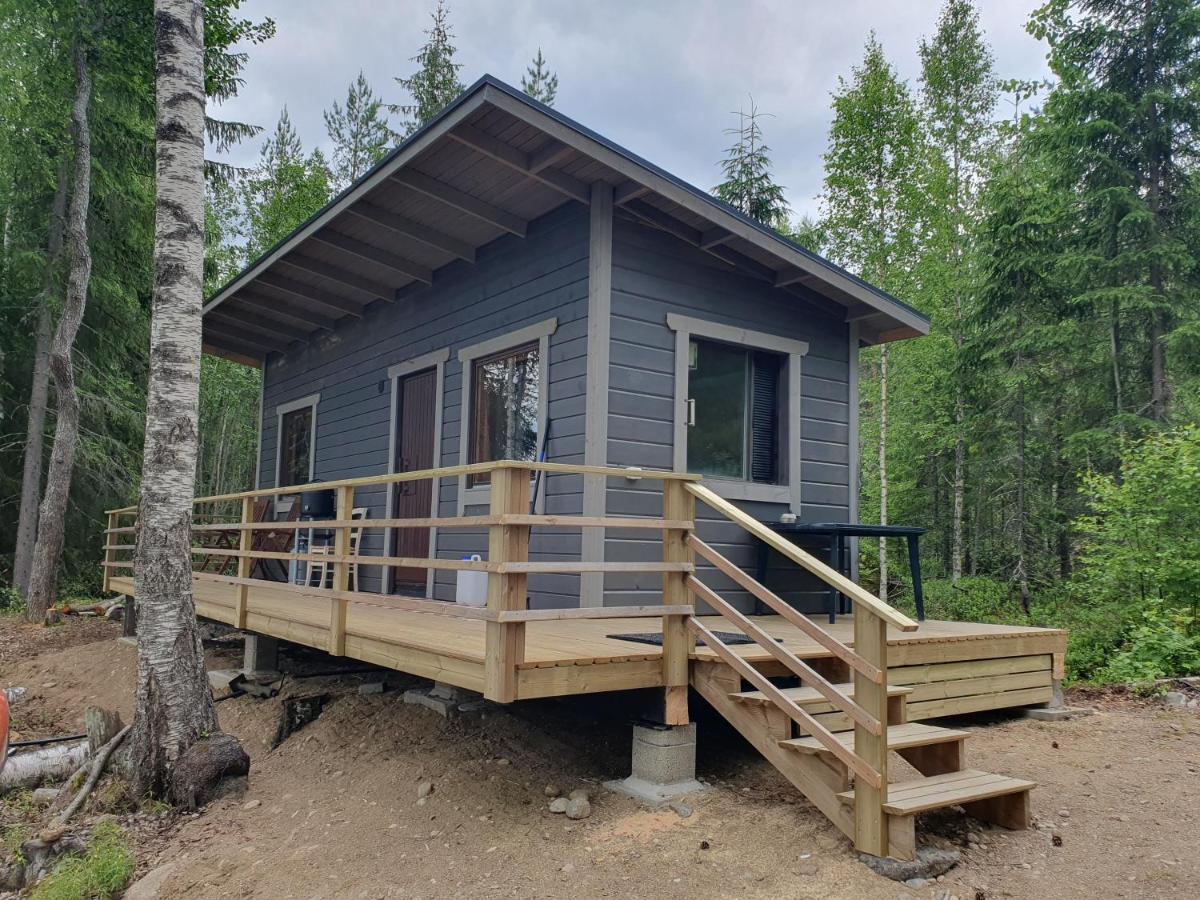 Mini cottage by lake Saimaa - B&B Enonkoski