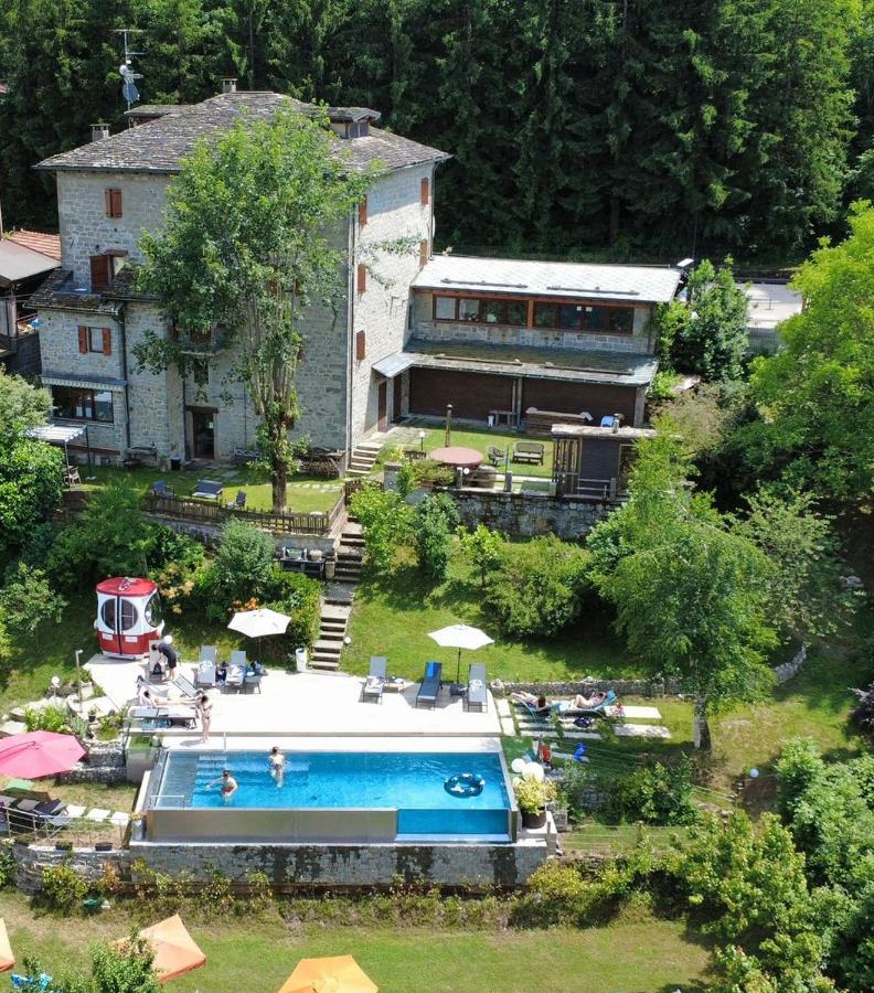 Casa Benassi ,Room&Suite , con piscina - B&B Riolunato