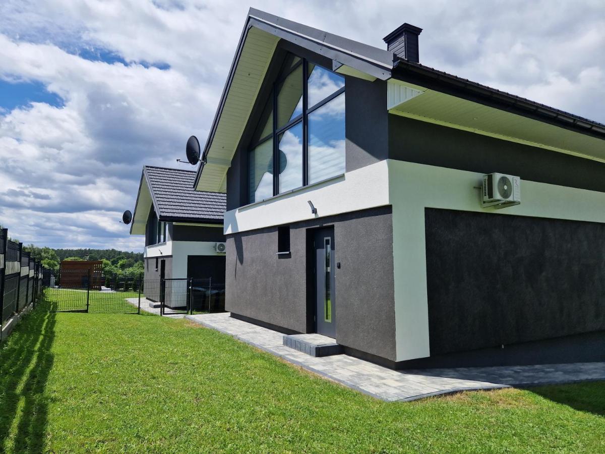 Domy na Roztoczu Aleja Lipowa B,G,J,K Sauna Jacuzzi Kajaki
