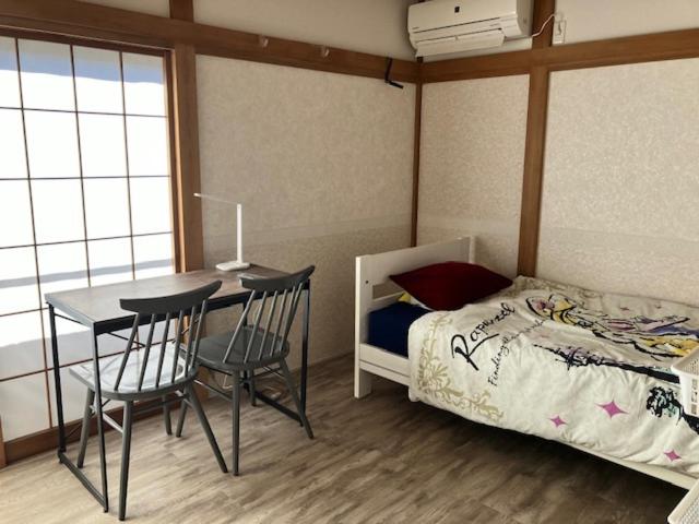 Single Room with Shared Shower and Toilet