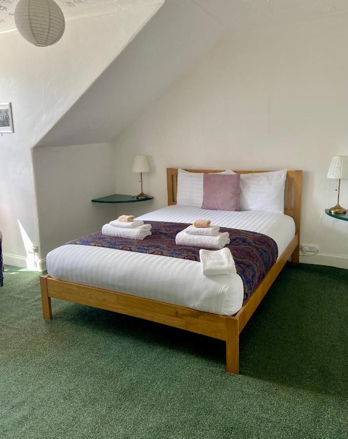 Queen Room with Shared Bathroom