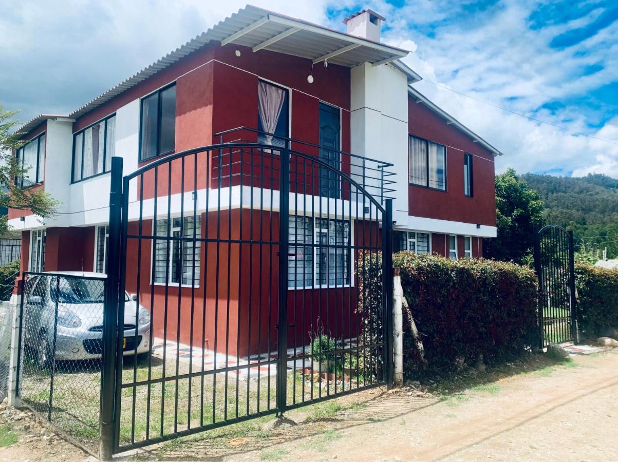 Trinity House Casa campestre cerca de Paipa - B&B