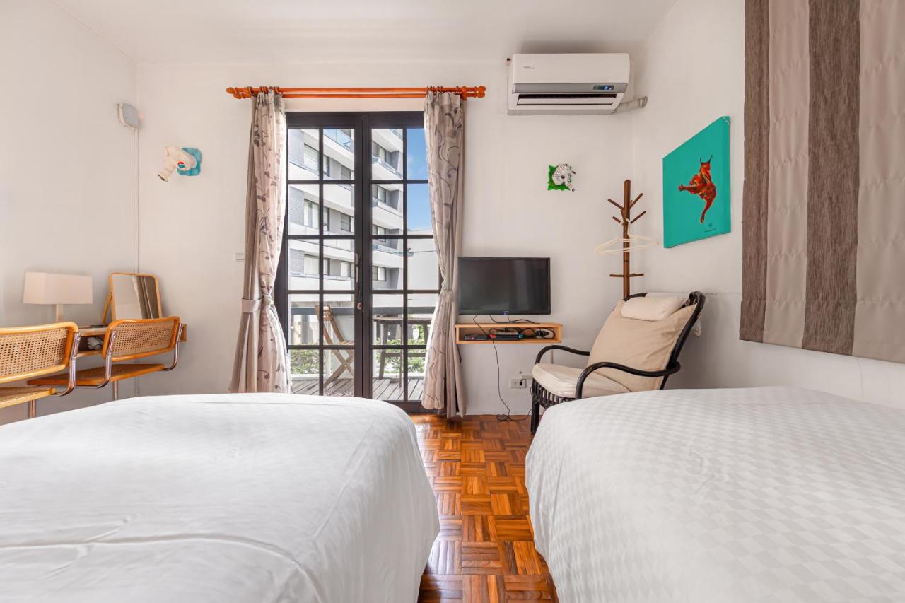 Twin Room with Balcony and Garden View