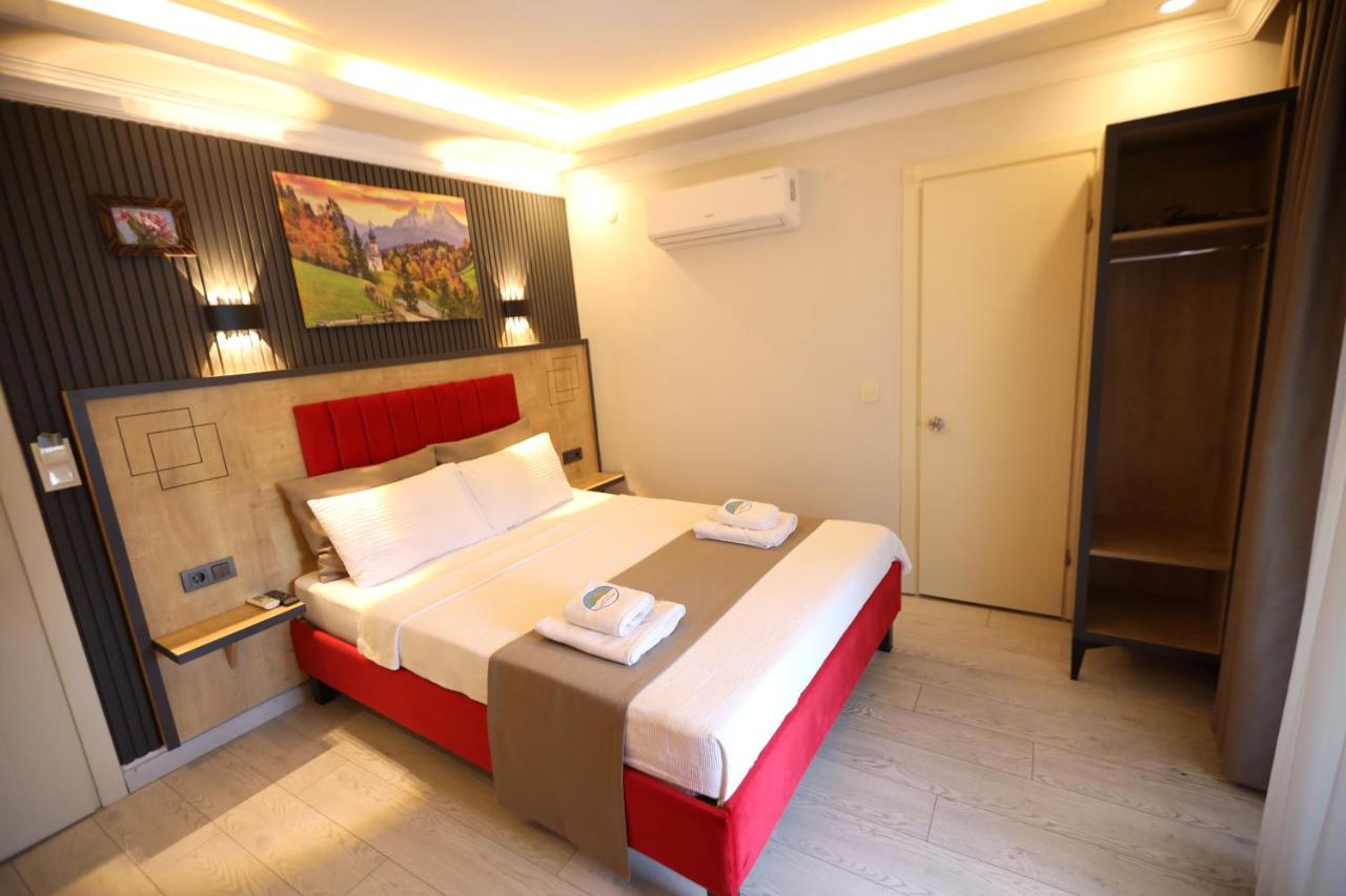 Chambre Double avec Balcon (2 Adultes + 1 Enfant)
