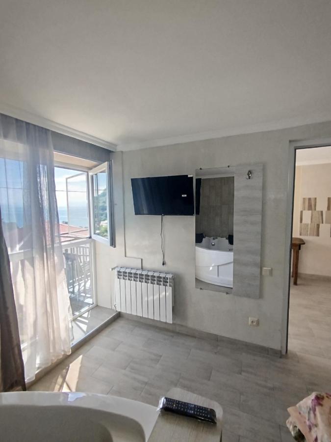 One-Bedroom Apartment with Balcony and Sea View