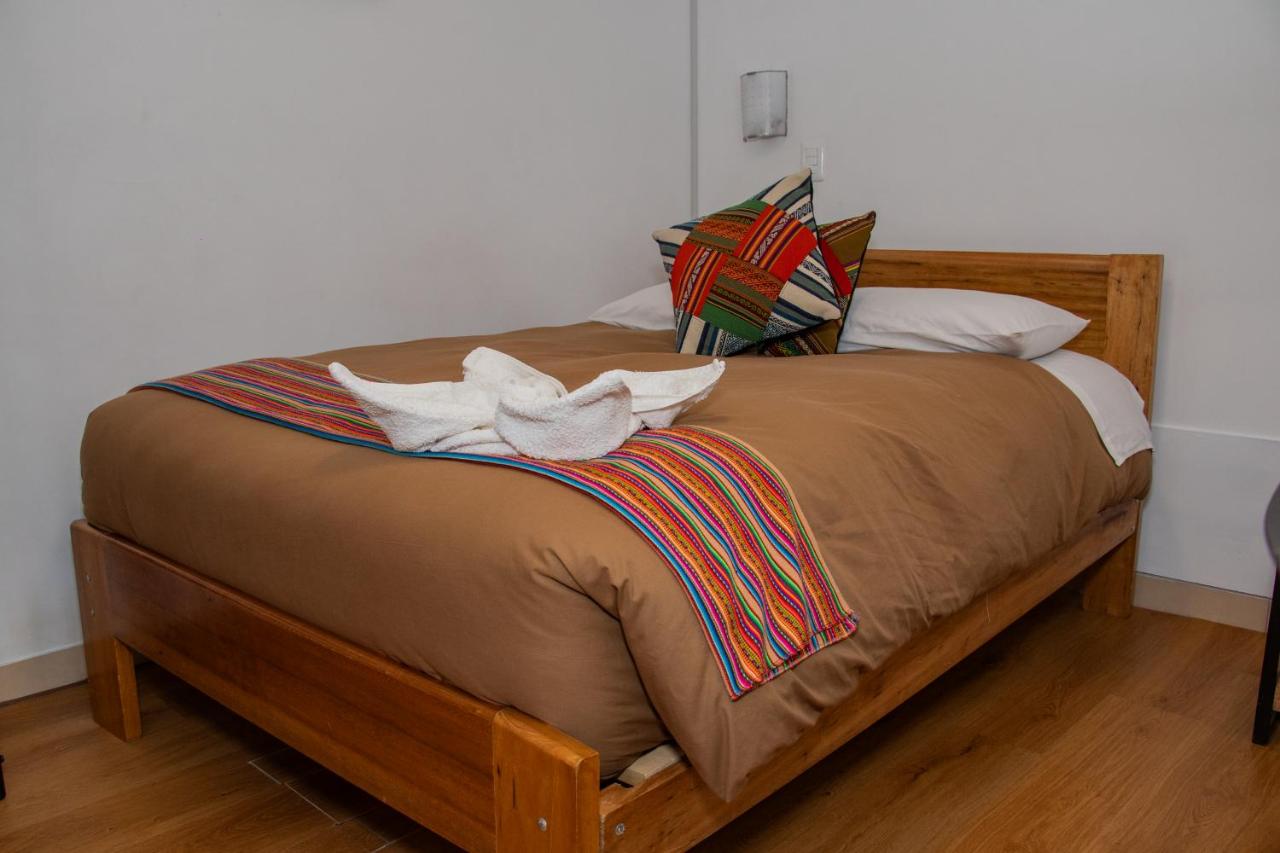 Zimmer mit Queensize-Bett und Gemeinschaftsbad