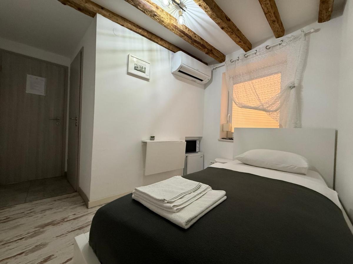 Camera Singola con Bagno Privato