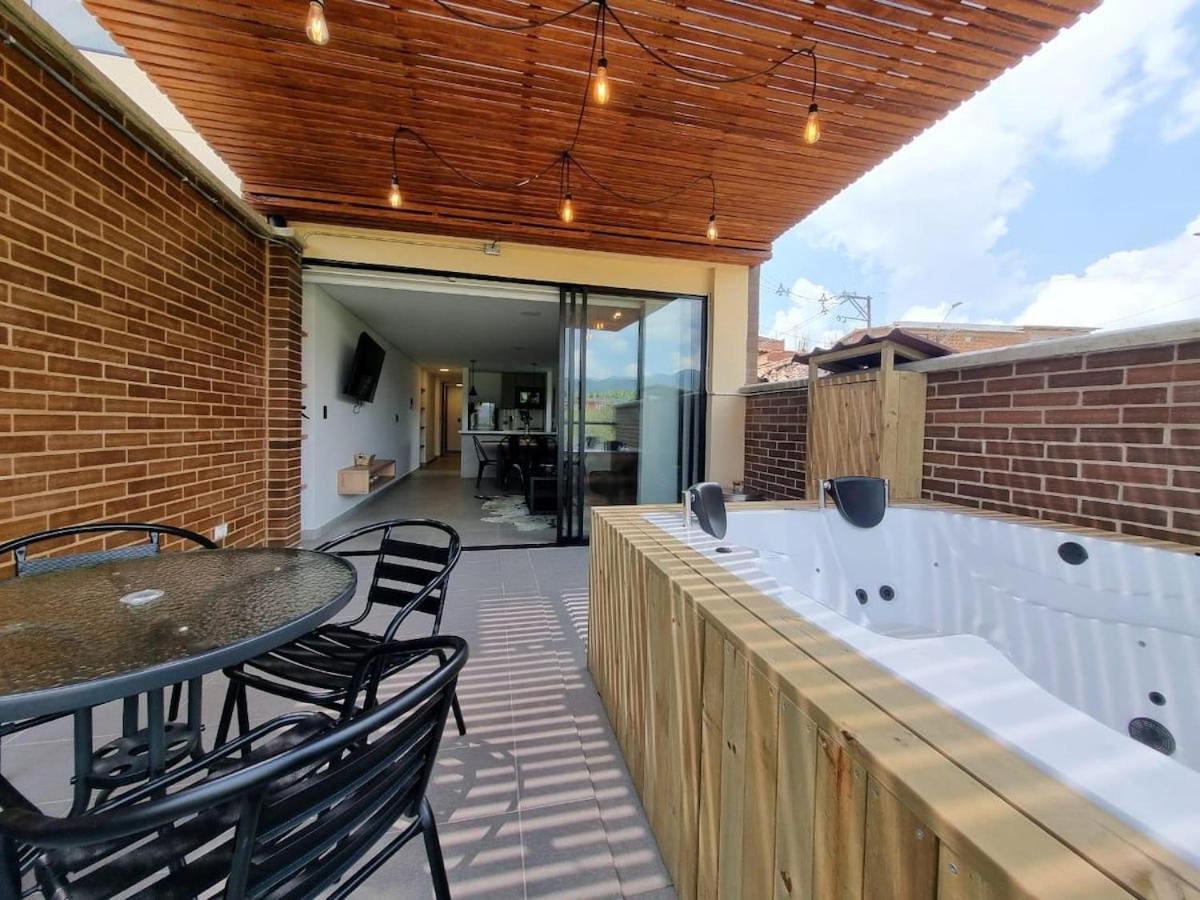 Apartment with a hot tub and a view of Guatapé lake - Chambres d'hôtes Guatapé