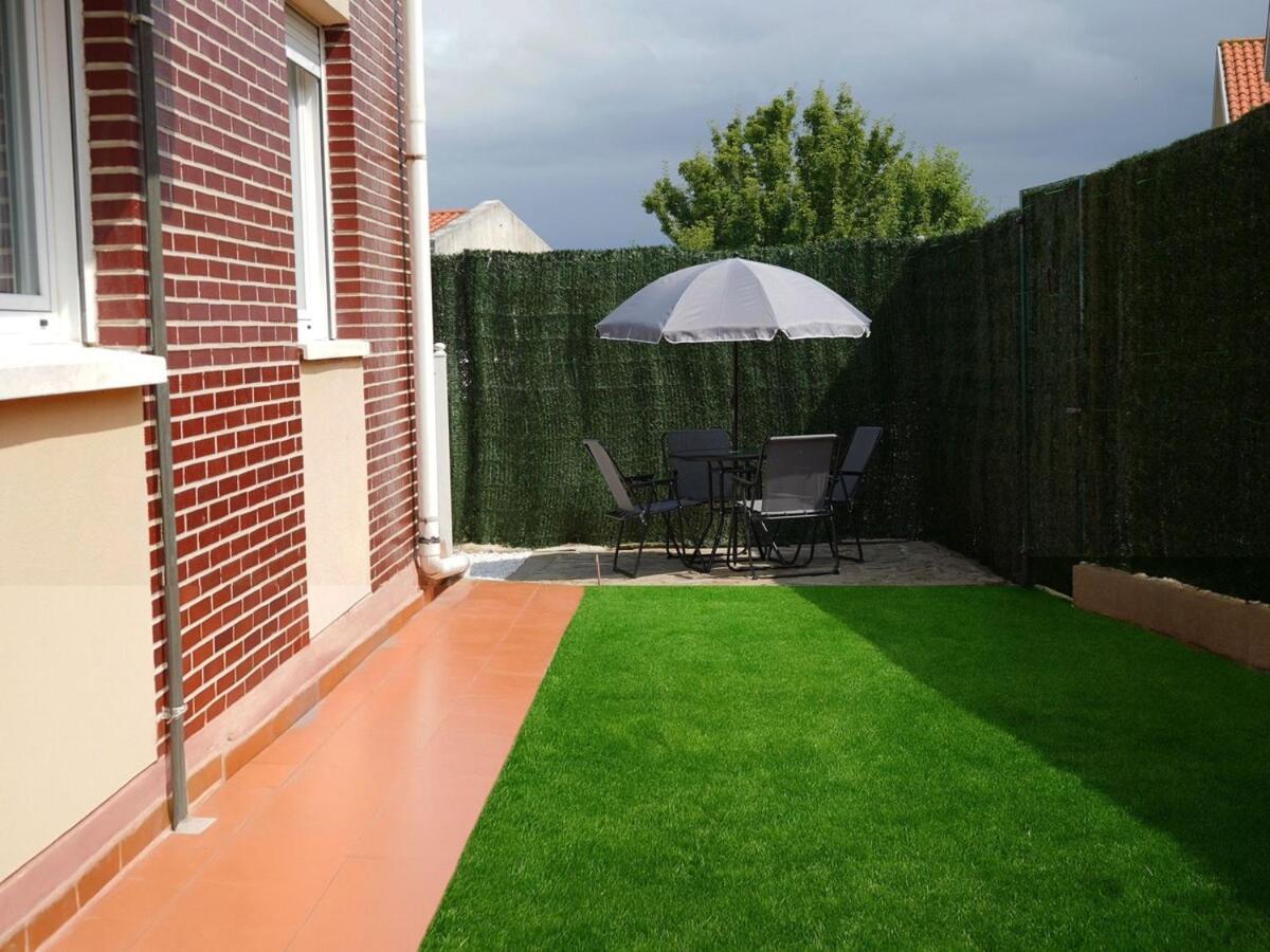 Bajo con jardin Costa Quebrada - B&B
