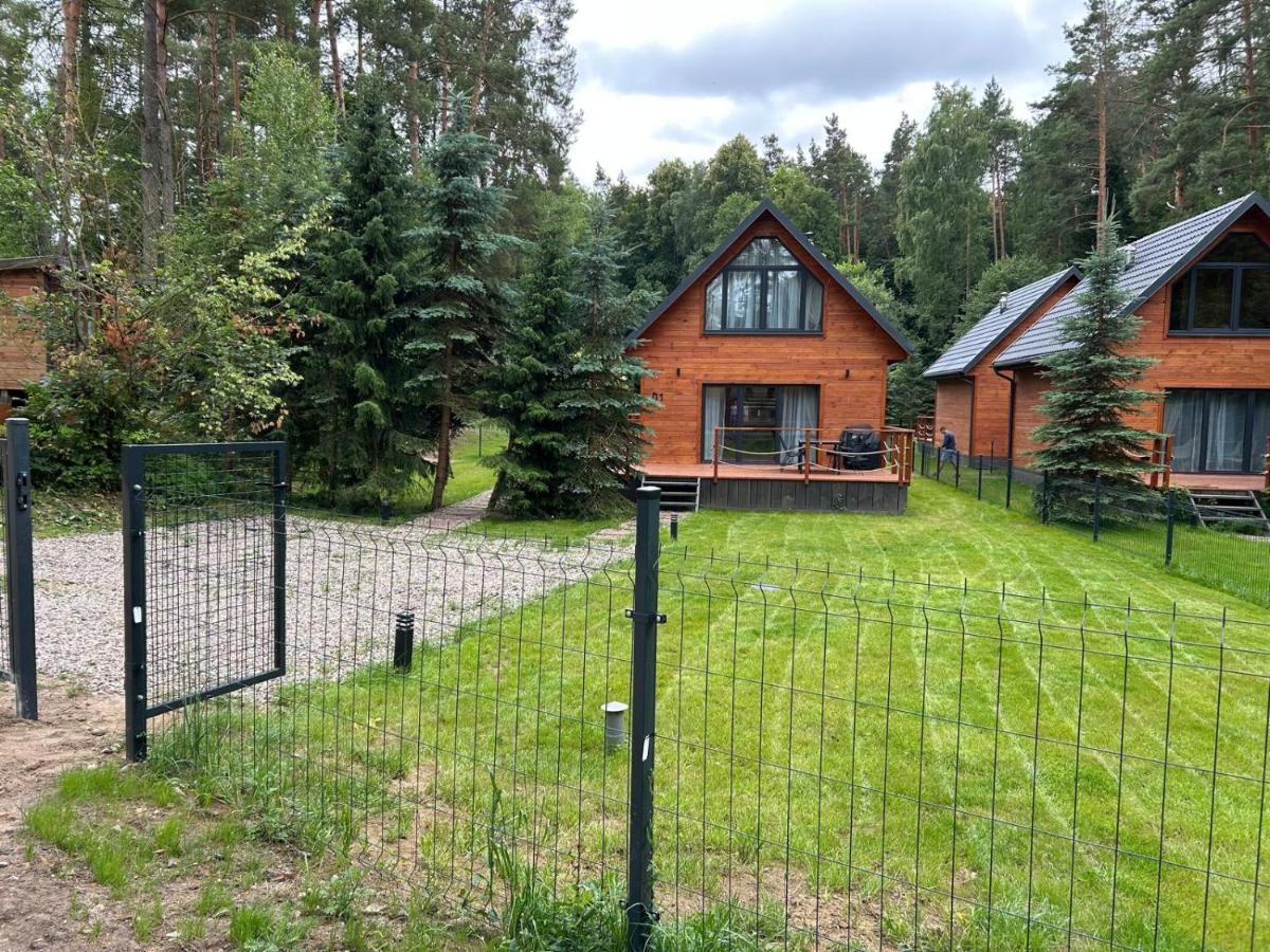 Leśne Domki nad Dadajem - Bed and Breakfast Wilimy