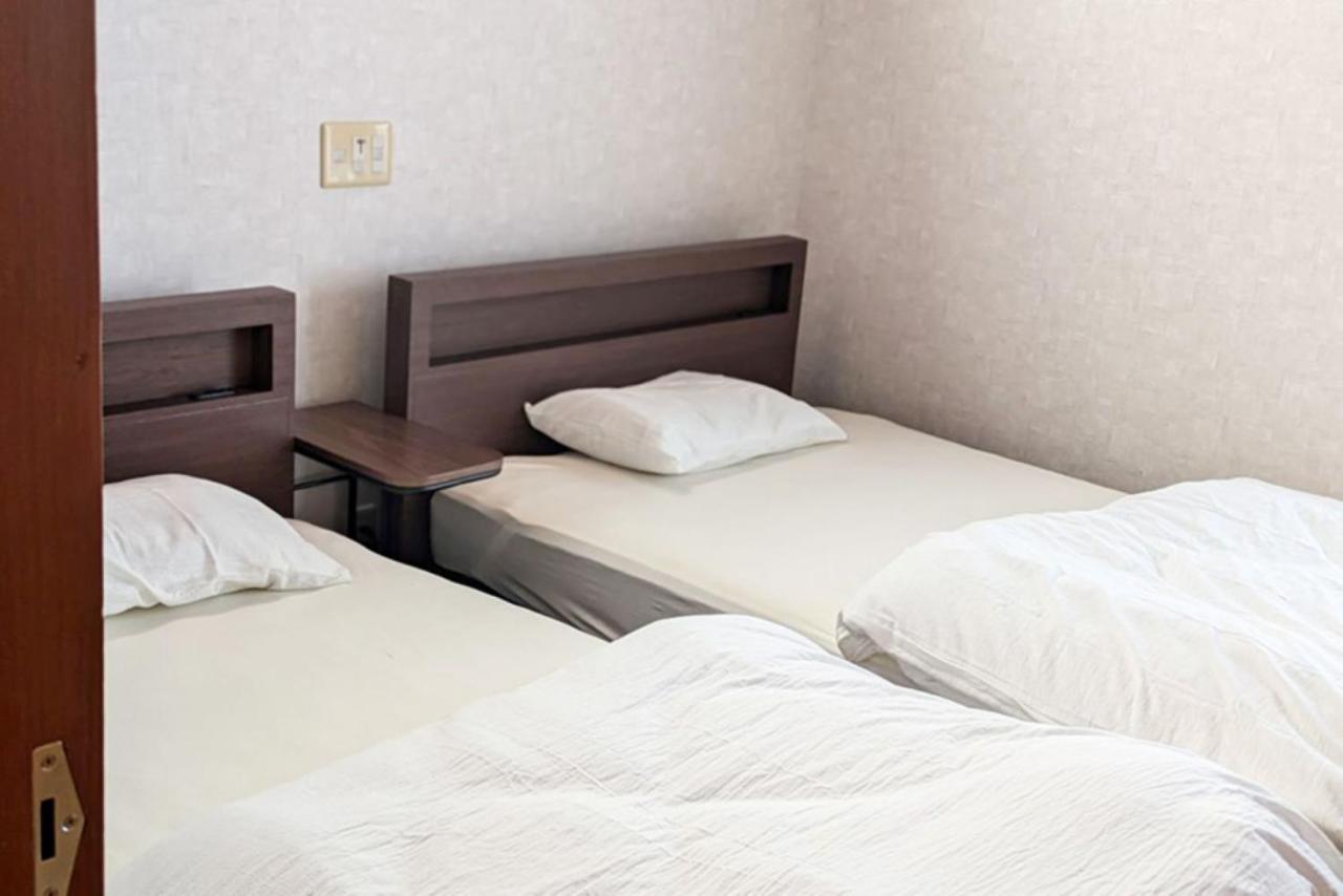 Quadruple Room with Shared Bathroom
