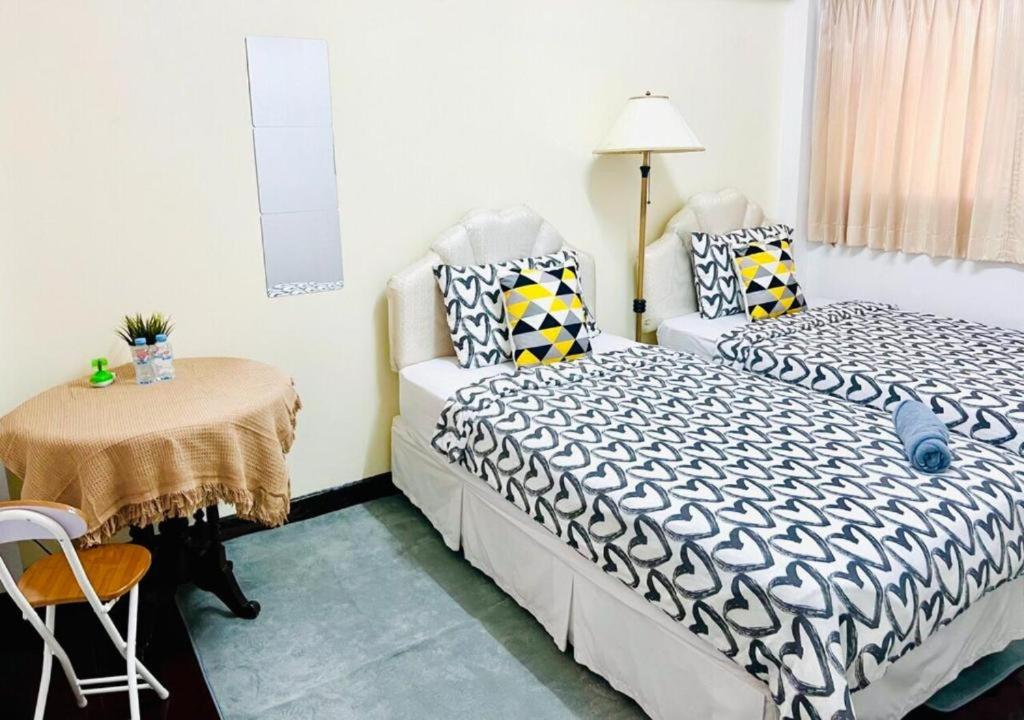 Habitación Doble con baño privado externo - 2 camas