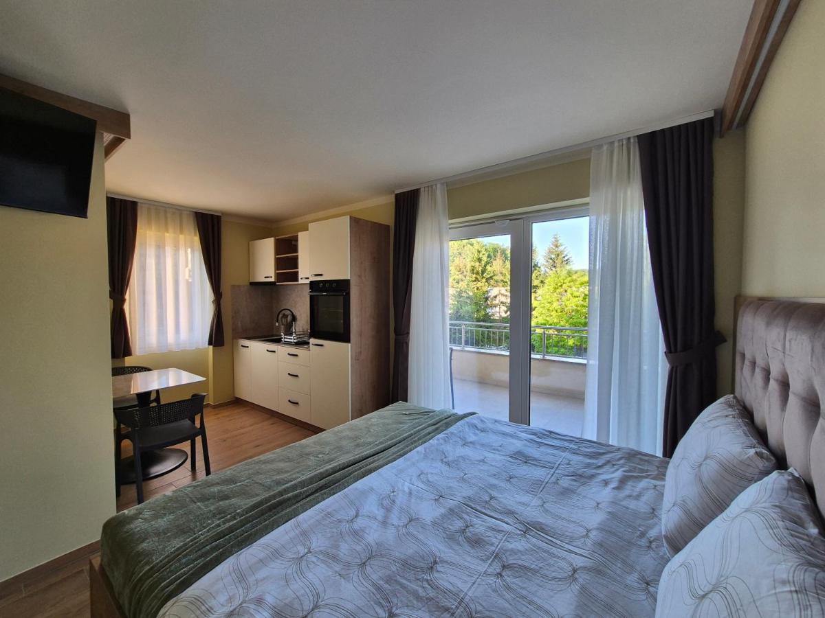 One-Bedroom Apartment with Balcony and City View