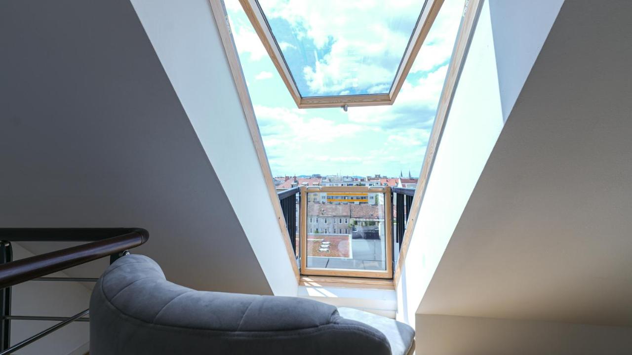 Großes Maisonette-Apartment mit 1 Schlafzimmer und Gemeinschaftsterrasse