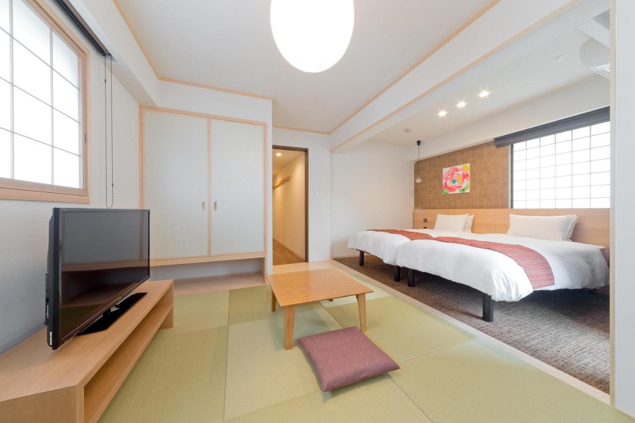 Camera Deluxe Doppia con Letti Singoli e Area Tatami
