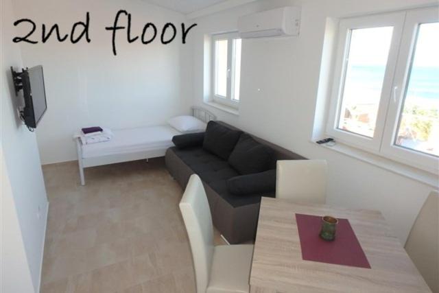 One-Bedroom Apartment with Balcony and Sea View