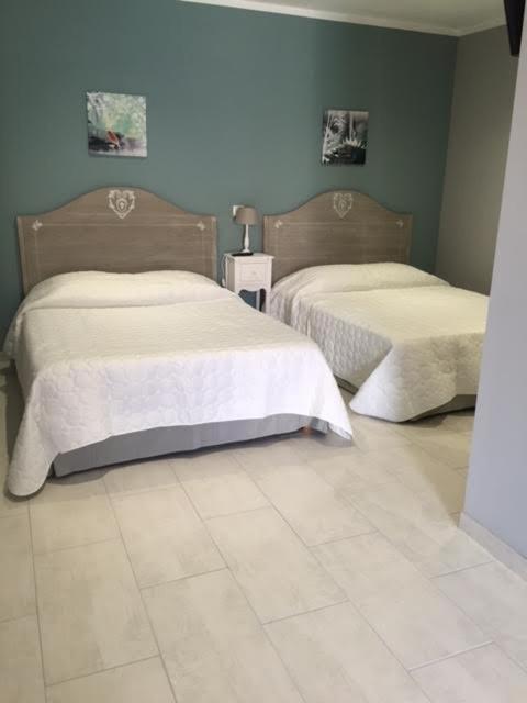Kamer met 2 Queensize Bedden