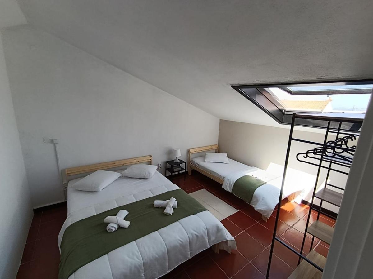 Camera Tripla Basic con Bagno in Comune