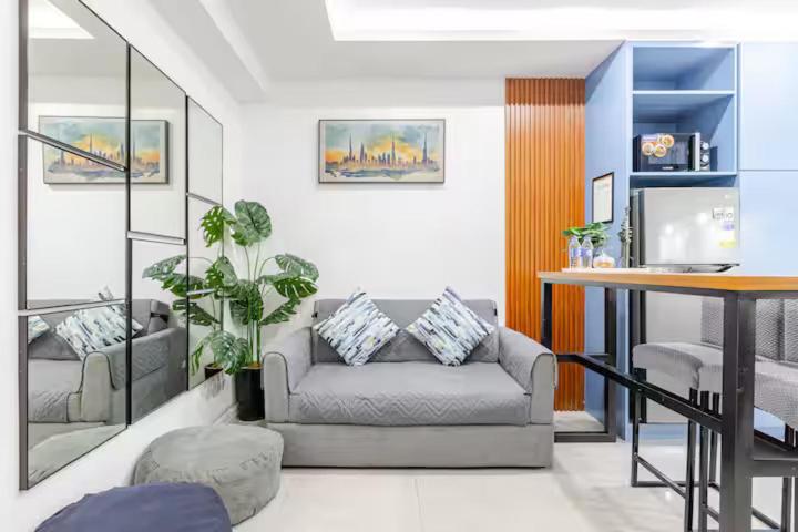 Balai ni Boss - Cozy Modern 1BR in Victoria Sports Tower - B&B