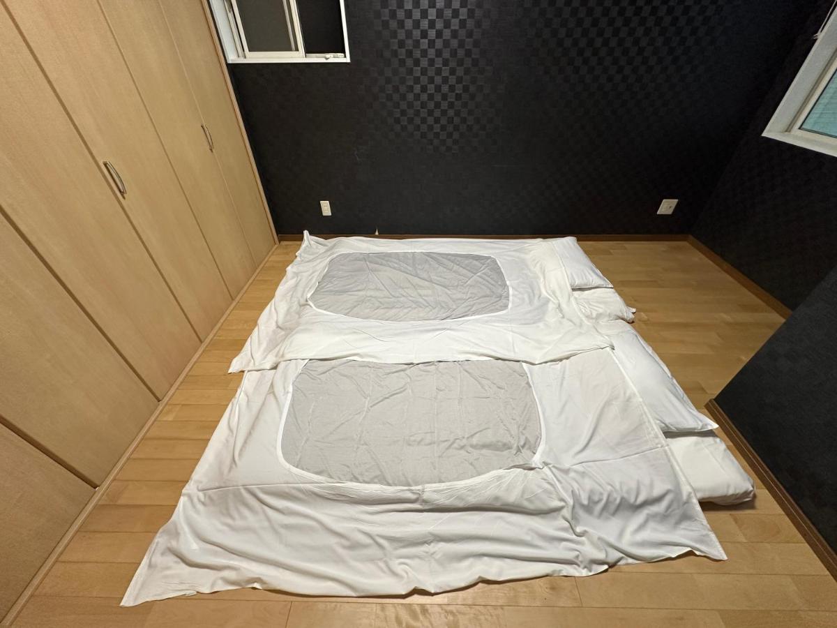 Tweepersoonskamer met 2 Aparte Bedden