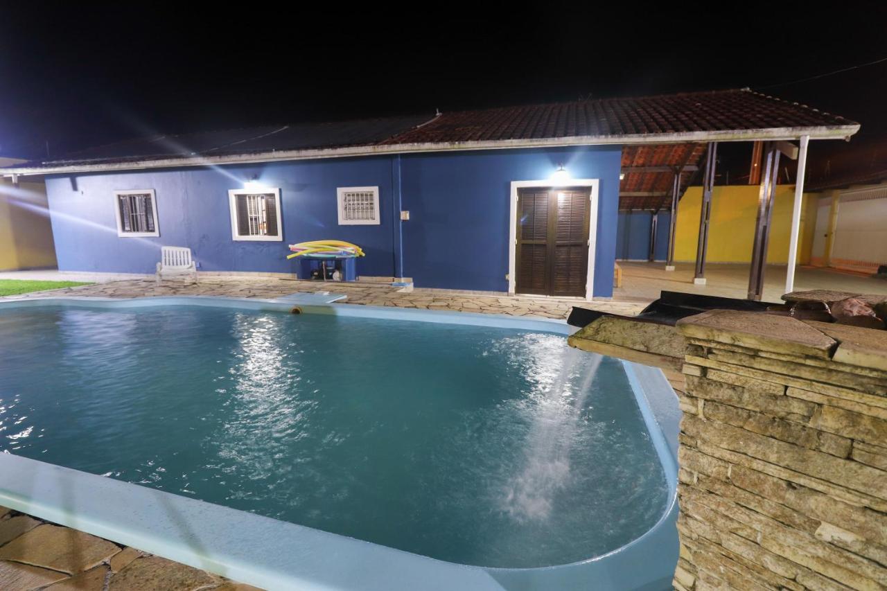 Casa piscina aquecida 400m da praia - B&B Bertioga