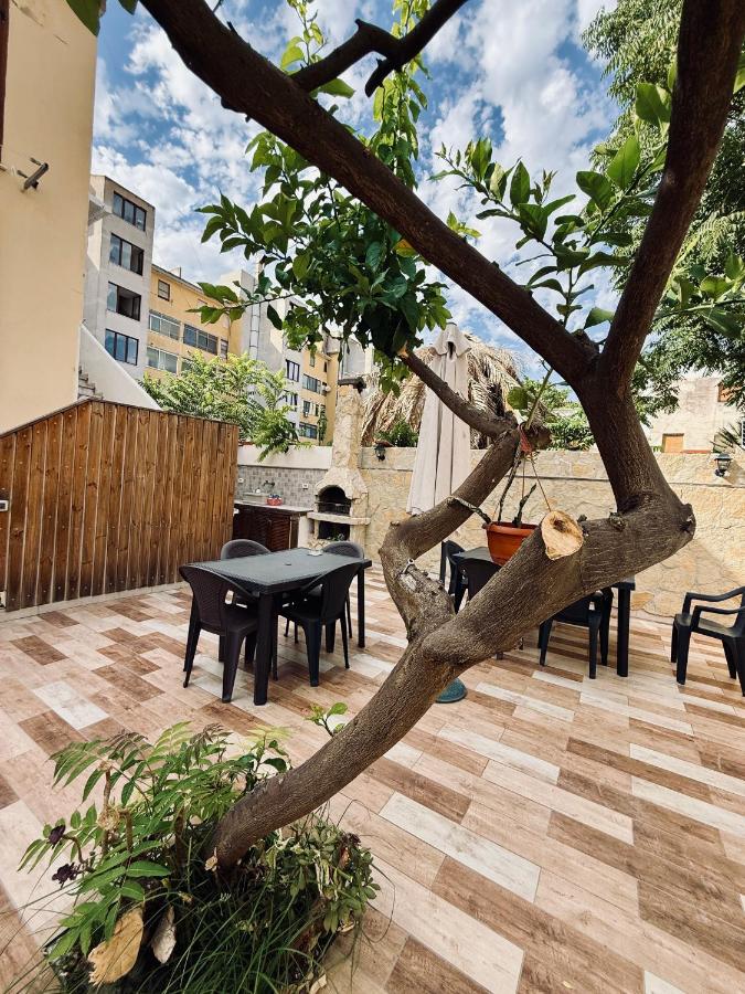Casa Vacanza con cucina in giardino e parcheggio - Chambres d’hôtes Alghero