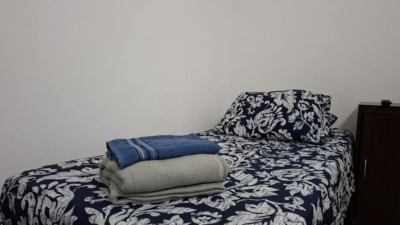 Camera Singola con Bagno in Comune