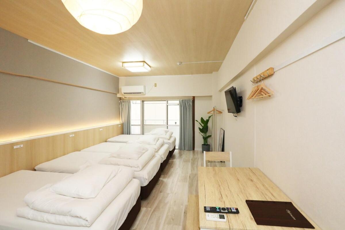 UNE apartment hotel 大阪なんば - Chambres d’hôtes Osaka