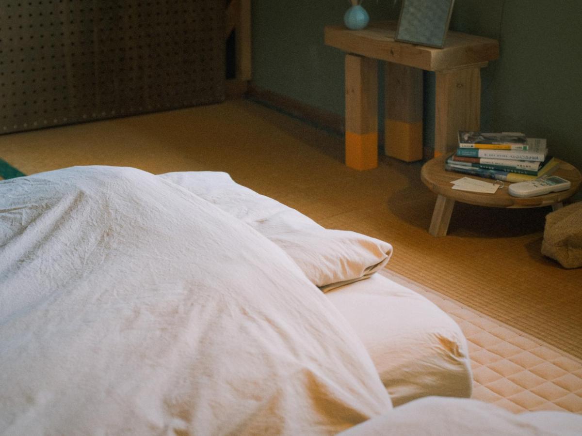 Chambre Triple avec Toilettes Communes