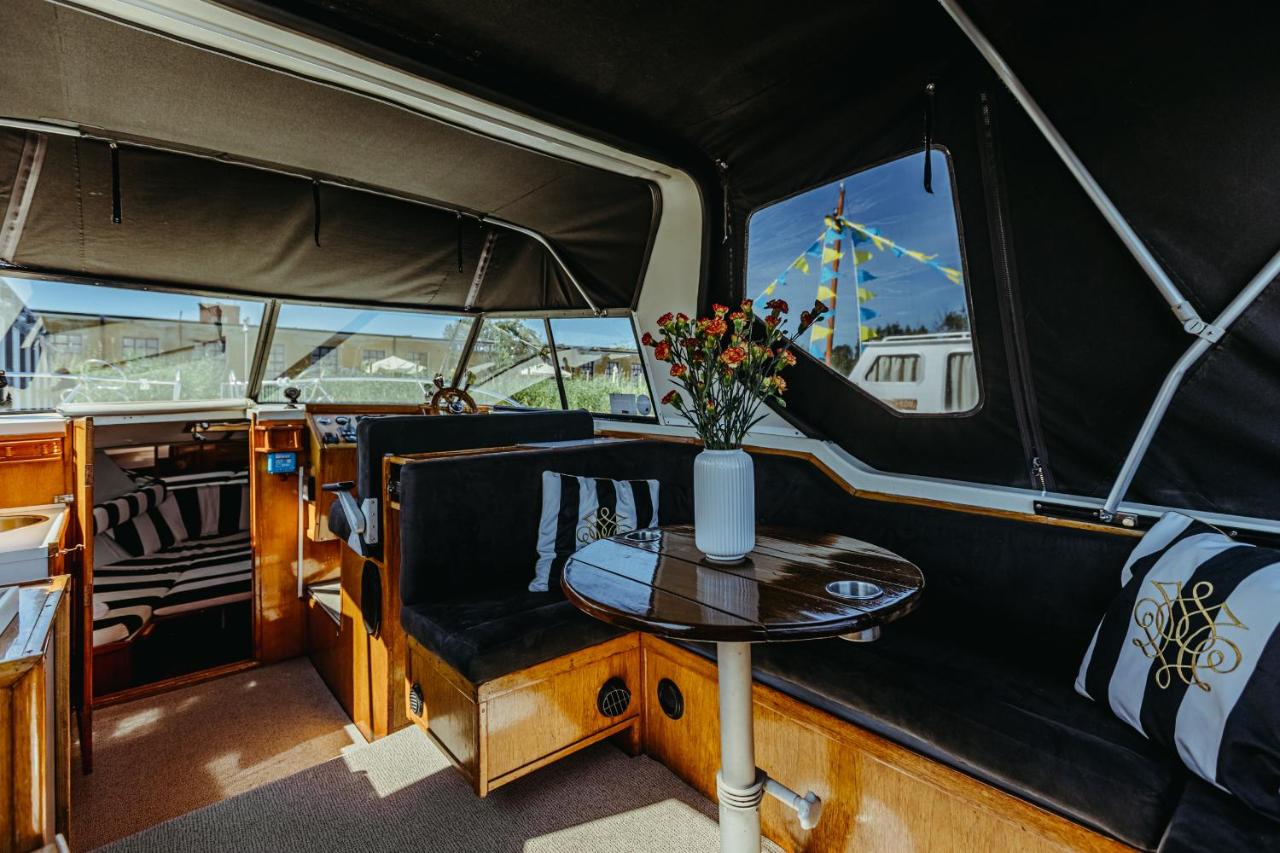 Boat with private pedal boat and SUP boards