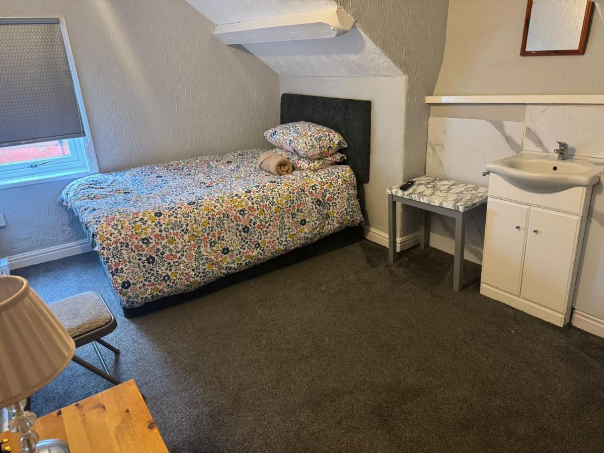 Camera Singola con Bagno in Comune