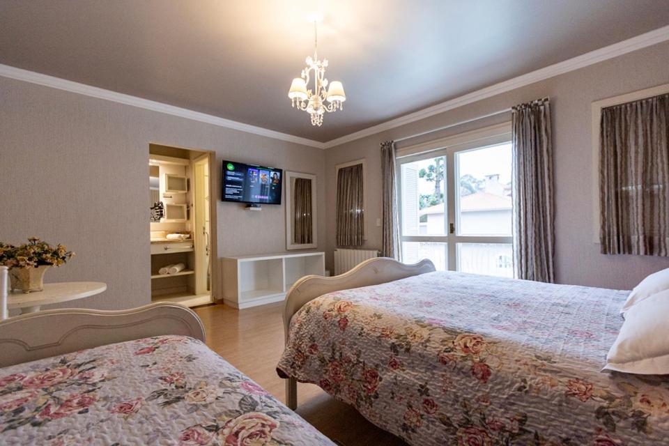 Superior Quadruple Suite com Smart TV