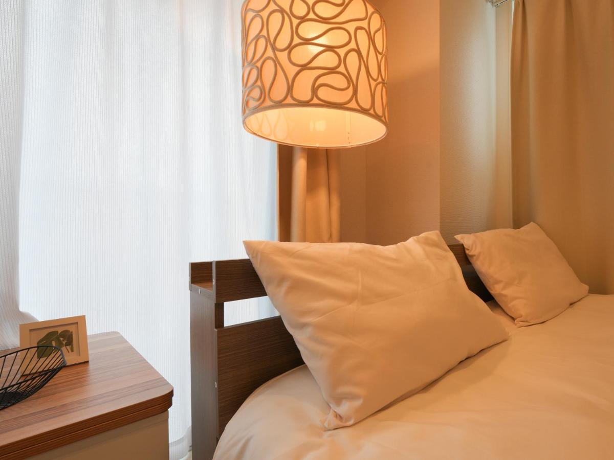 We support a comfortable trip Direct access to Kansai Airport Room in the center of Osaka Maximum 4 people Room 501 - B&B Osaka