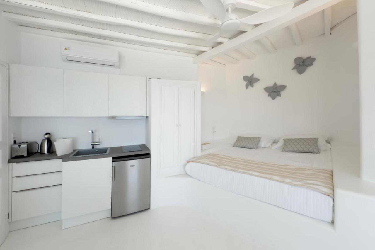 Junior Suite with Private Terrace, Outdoor Jacuzzi and Panoramic Sea View