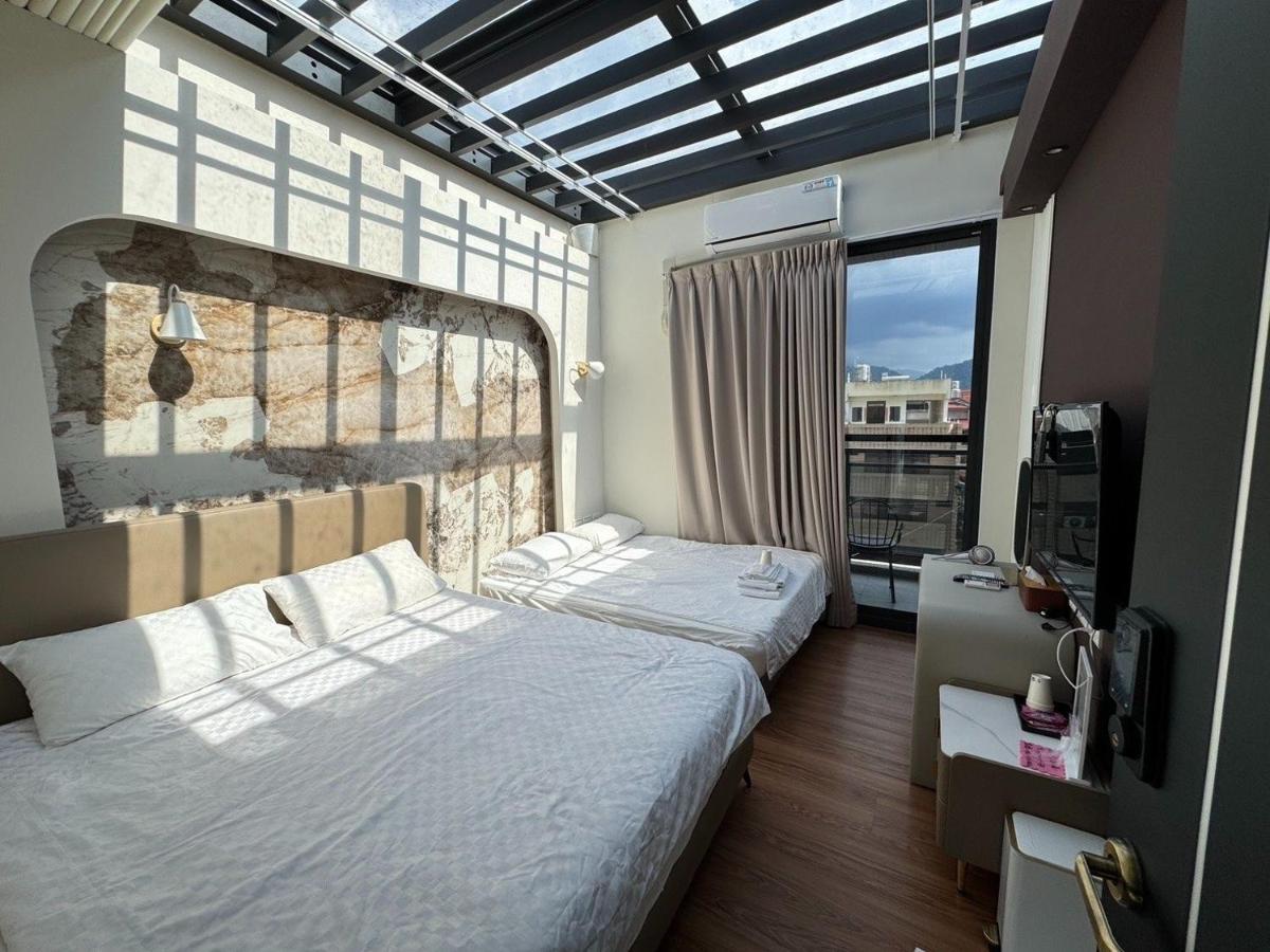Deluxe Quadruple Room with Balcony