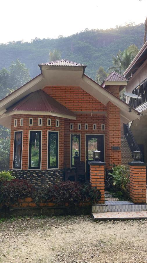 Kenzona Homestay - Chambres d'hôtes Andalas Dua