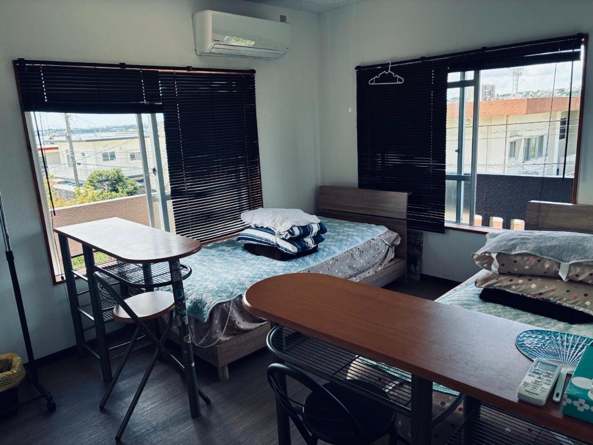 Twin Bedroom with Shared Bathroom