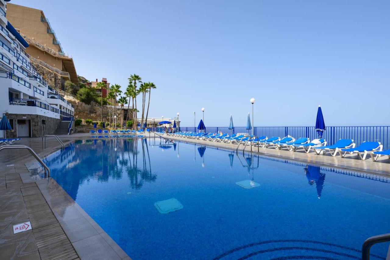 Charming Apartment with Terrace, Swimming pool and Sea views - B&B Taurito