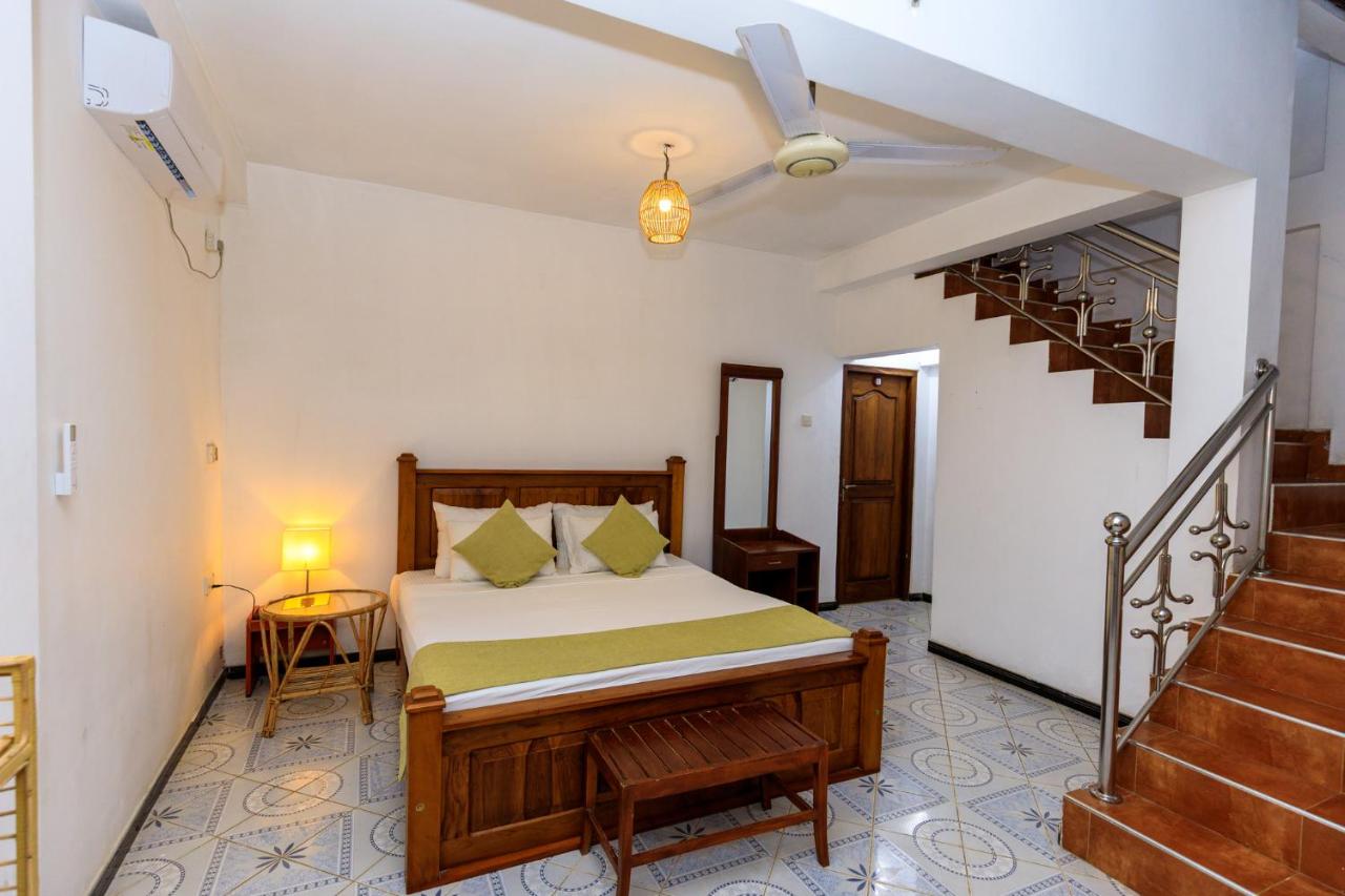 Habitación Familiar con vistas al jardín