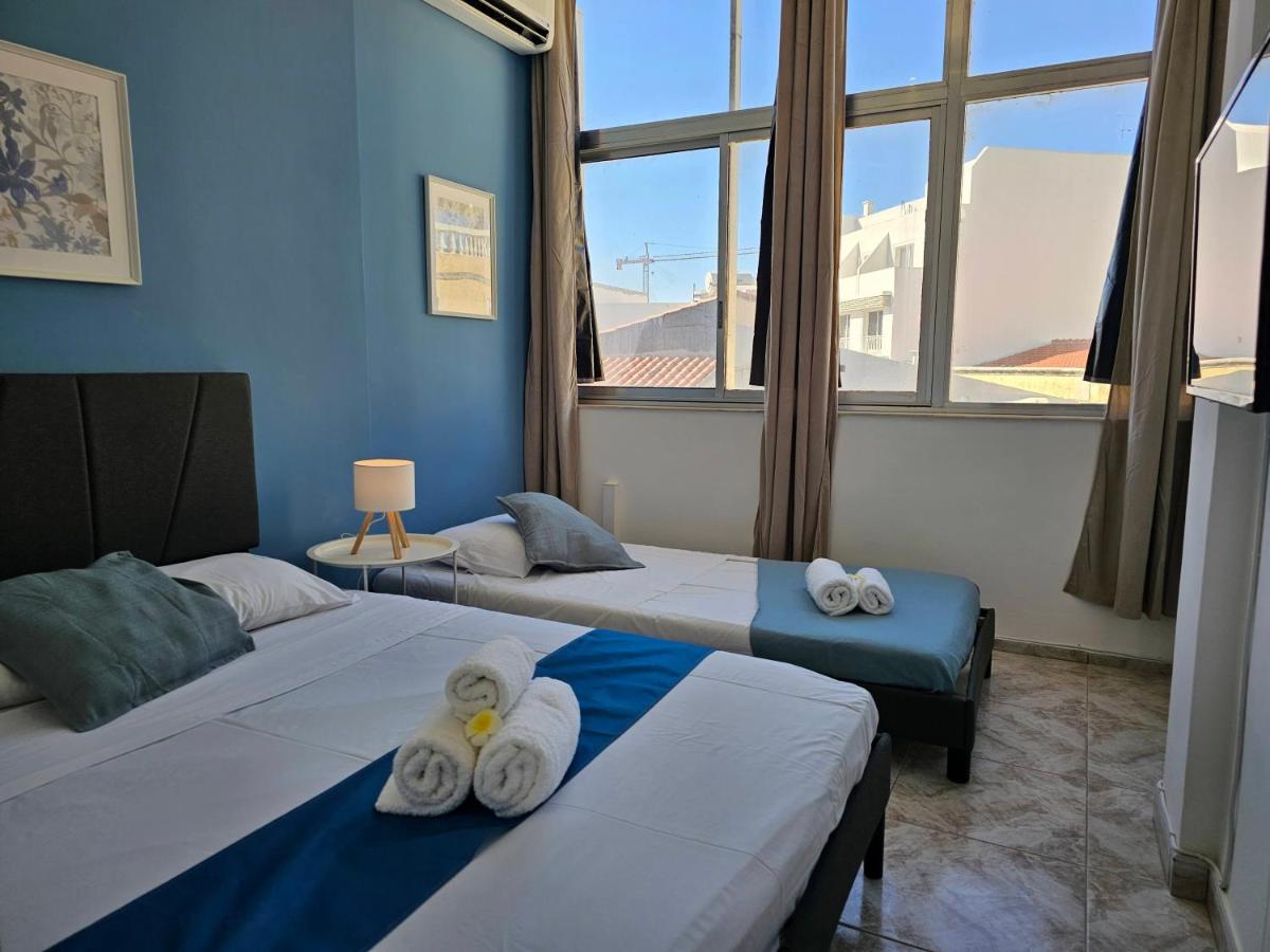 Chambre Triple avec Salle de Bains Commune