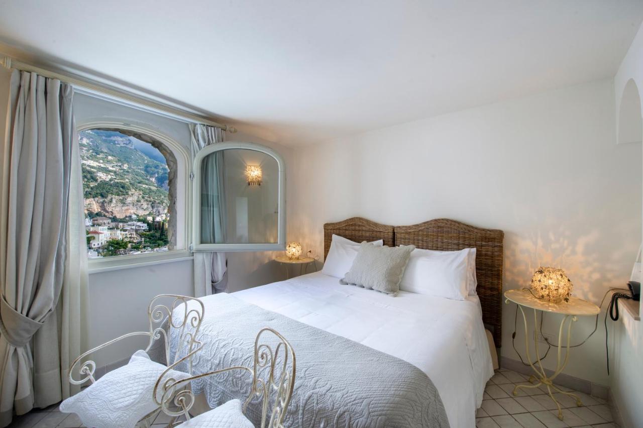 Zimmer mit Queensize-Bett und Gartenblick