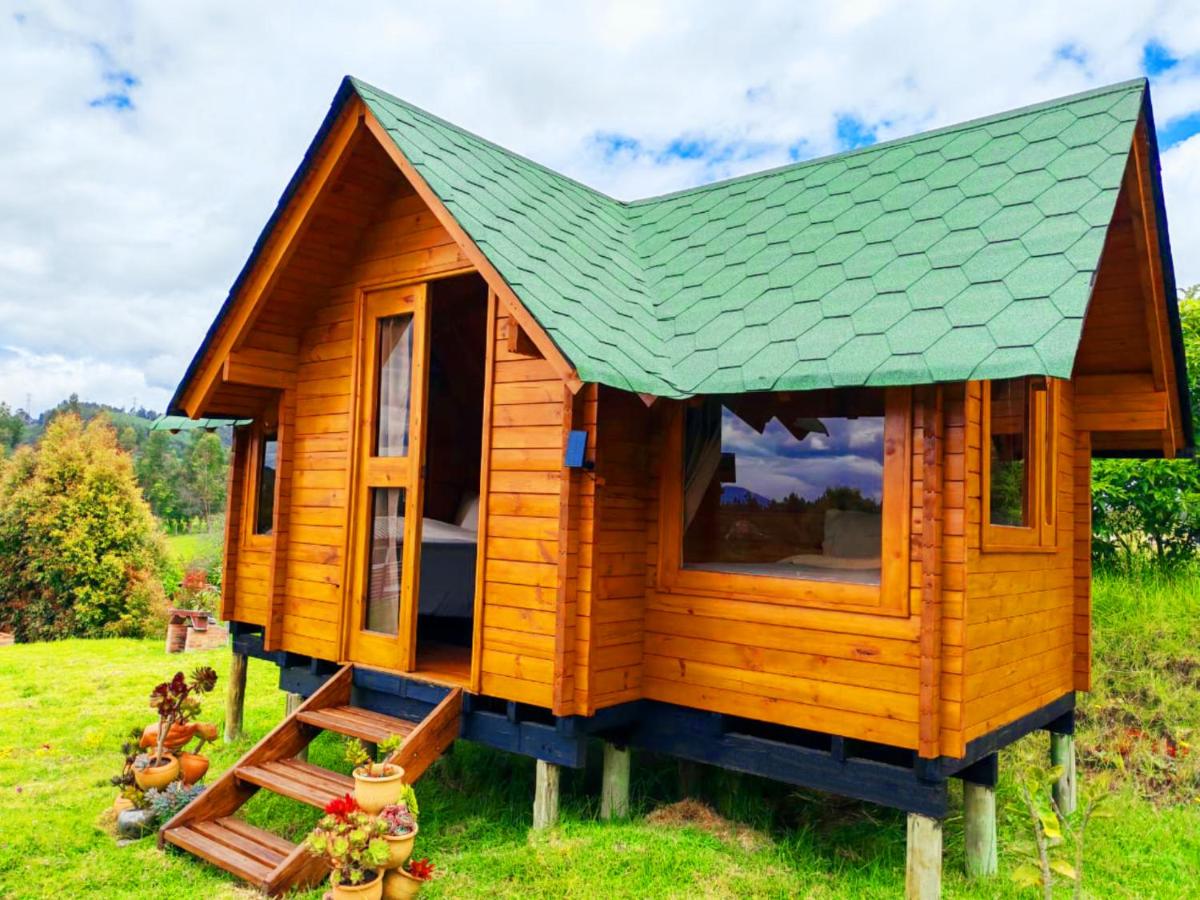 Tacama, acogedoras cabañas cerca a termales - B&B Paipa