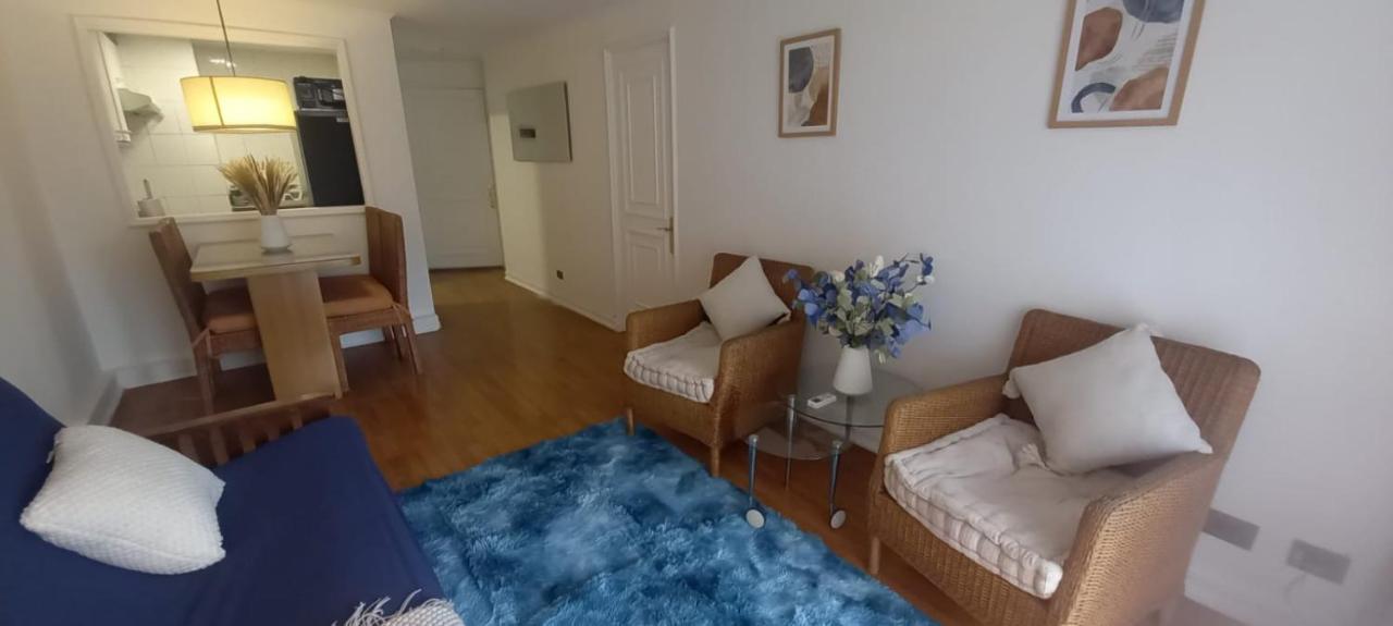 One-Bedroom Apartment with Balcony and City View