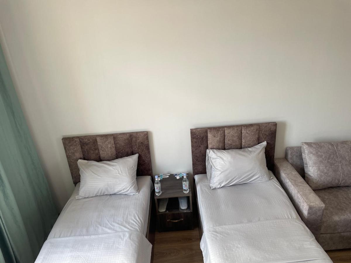 Tweepersoonskamer met 2 Aparte Bedden